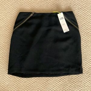 BCBGeneration mini skirt. 15 inches in length. Dress it up, or down!